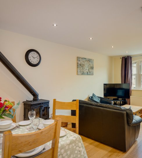 Cottage 2 living area with wood burning stove